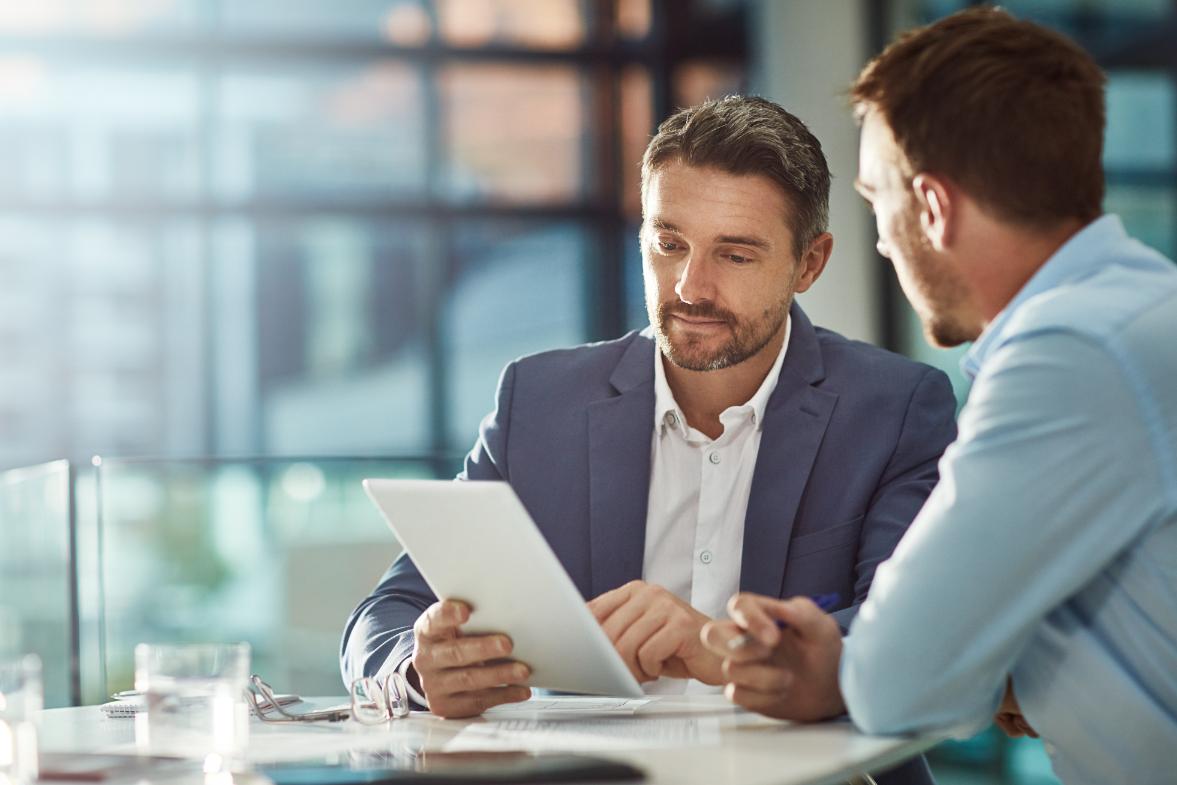 Business man meets with a customer and explains the process